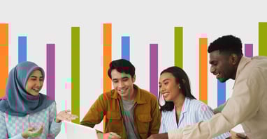 People collaborating over paperwork showing Strengths colors behind them