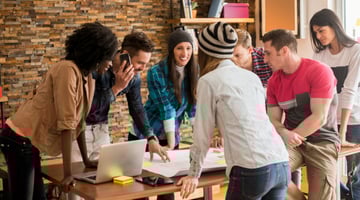 People collaborating over work